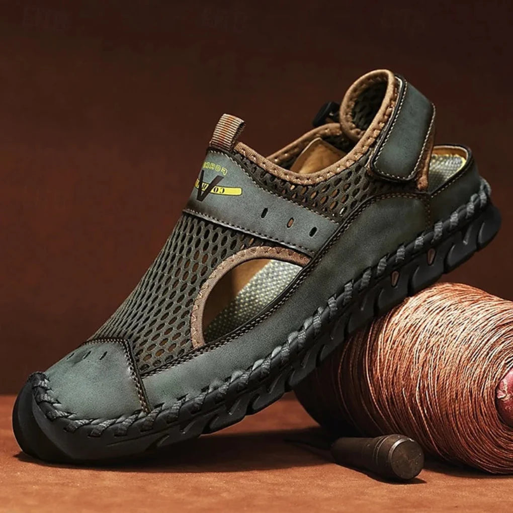 Stylish men's mesh sandals with balance support, ideal for casual wear, walking, or beach. Breathable & durable.