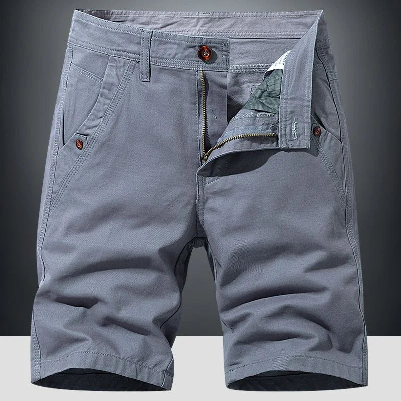 Men's comfortable relaxed fit chino shorts in a light color, perfect for warm weather and casual summer outfits.