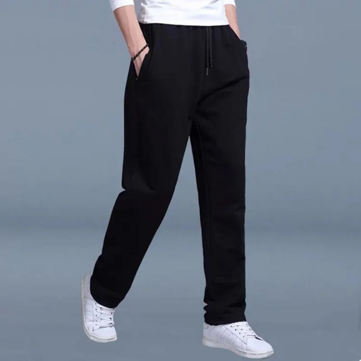 New men's joggers with a relaxed fit & drawstring waist, perfect for lounge & athletic activities.