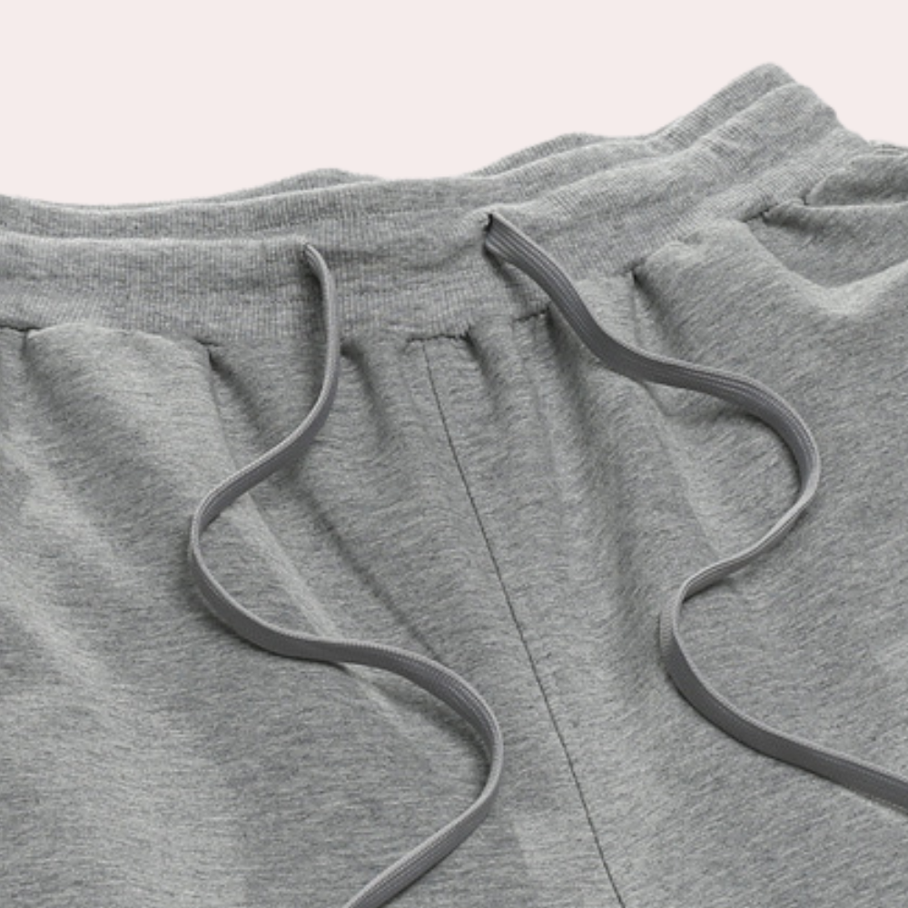 Athletic men's jogging pants, relaxed fit & breathable fabric, perfect for active lifestyles.