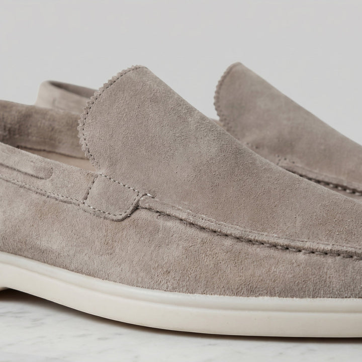 Elegant men's slip-on loafers, perfect as comfortable dress shoes or casual footwear.