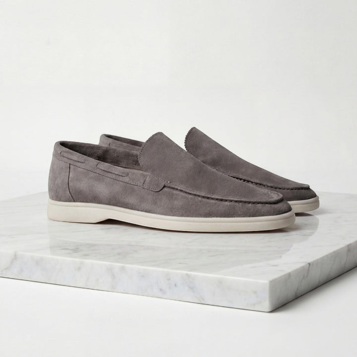 Versatile men's slip-on loafers, combining comfort with classic dress shoe elegance.