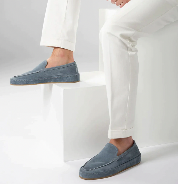 Classic men's slip-on loafers, versatile comfortable footwear for various styles.