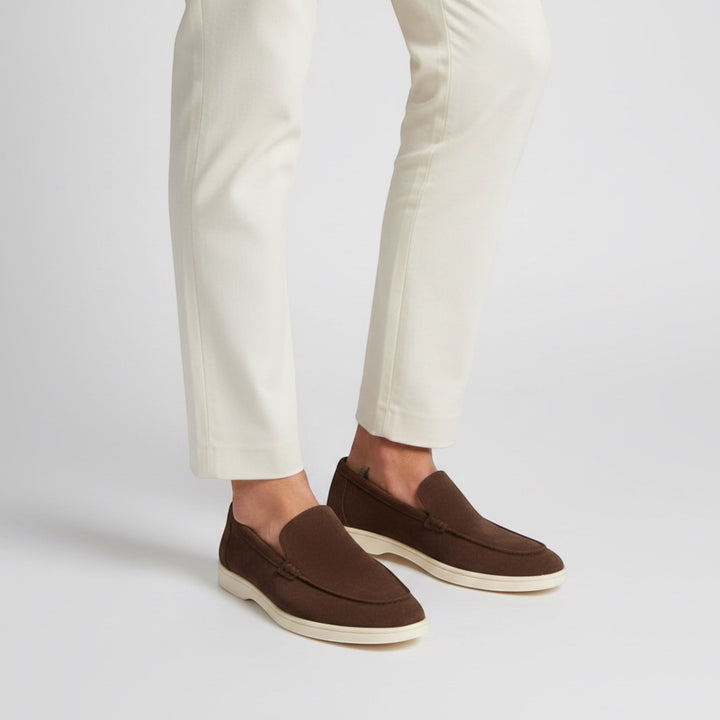 Modern men's slip-on loafers, blending comfort and elegance for summer outfits.
