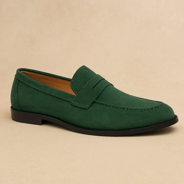 Classic men's slip-on loafers. Versatile flat heel shoes for casual or smart-casual outfits.