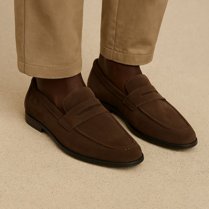 Side view of men's versatile slip-on loafers, highlighting comfortable design and classic appeal.