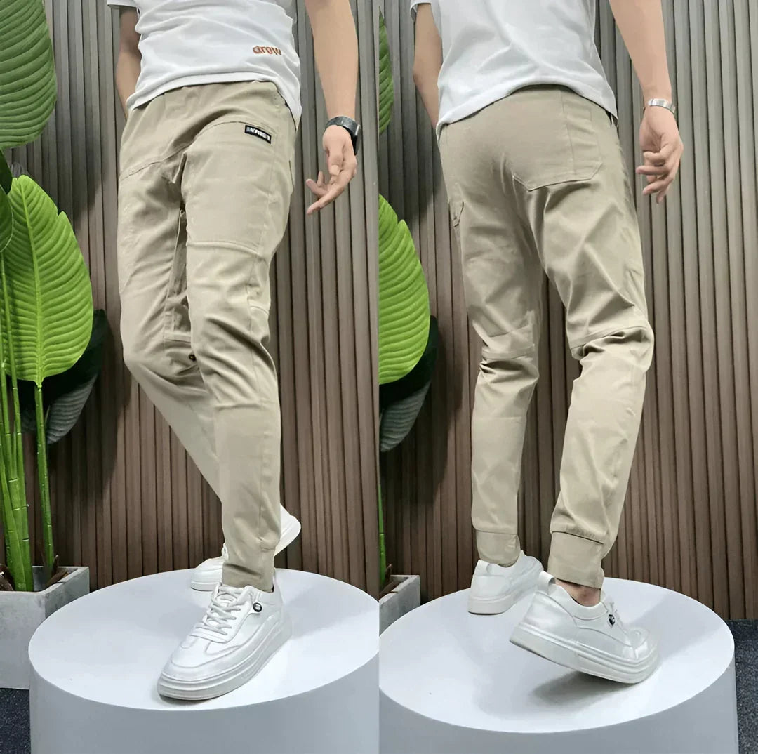 Men's comfy black elastic waist cargo pants. Perfect for everyday casual wear & outdoor activities.