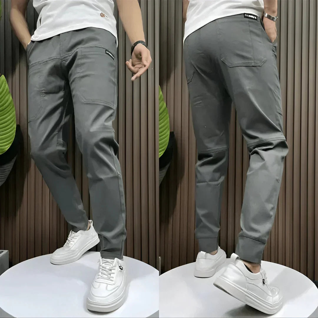 Durable men's outdoor cargo pants with elastic waist. Great for hiking, work, and active everyday comfort.