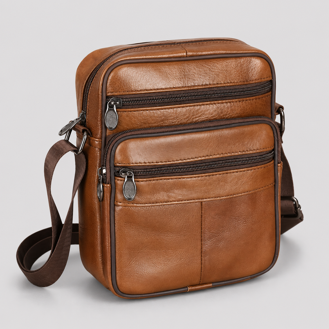 Modern men's compact leather travel shoulder bag, designed for daily essentials & on-the-go convenience.