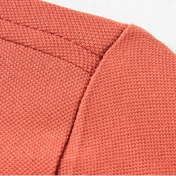 Side profile of a men's short sleeve polo shirt, showing the flattering modern fit & stylish contrast collar.