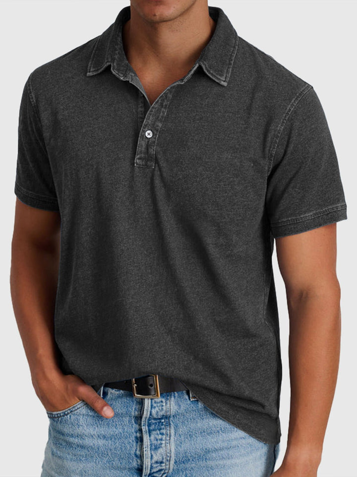 Everyday wear men's short sleeve polo. Made from cotton, features a button closure & polo collar for comfort.