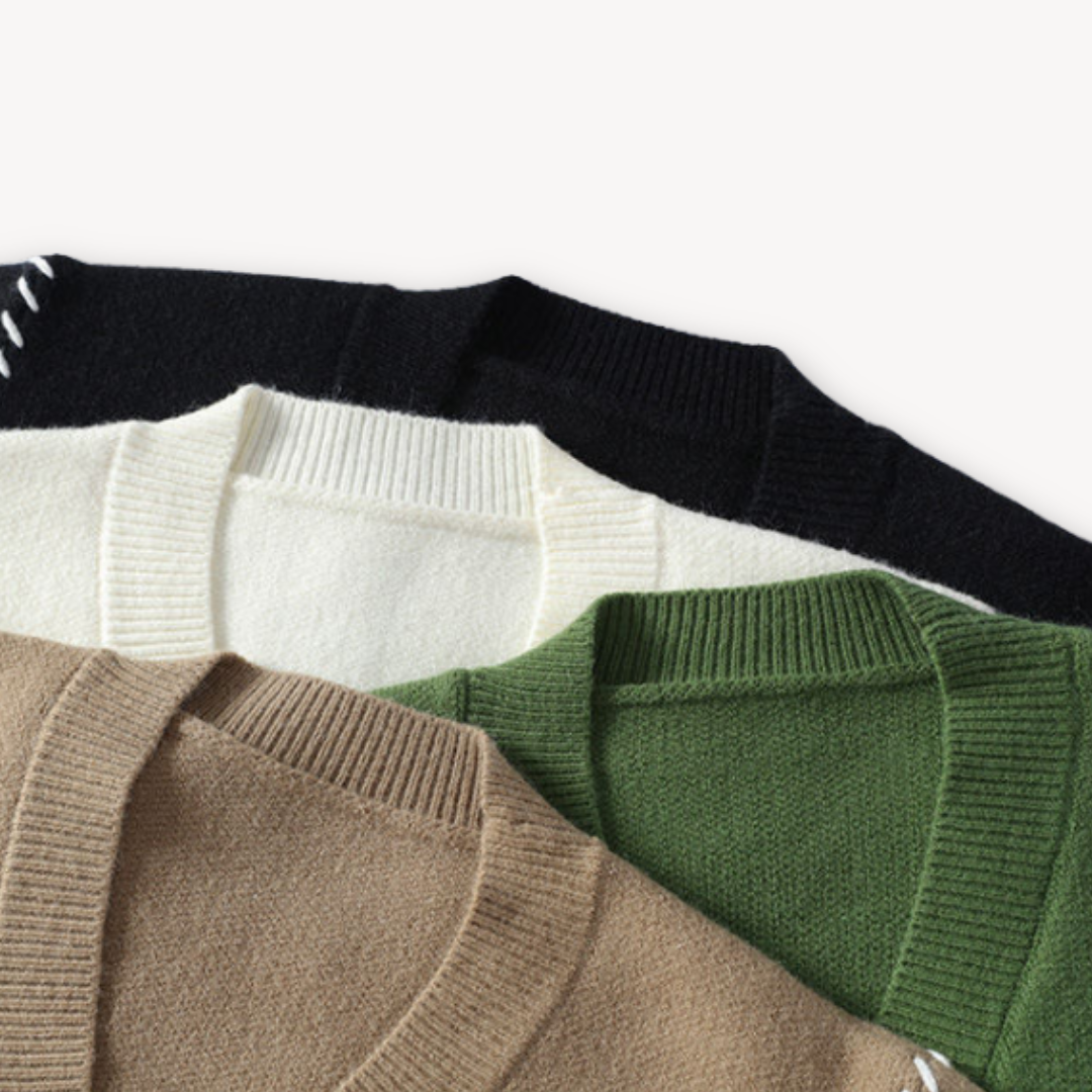 Modern men's knitted button-up long-sleeve cardigan sweater in a comfortable, cozy fabric.