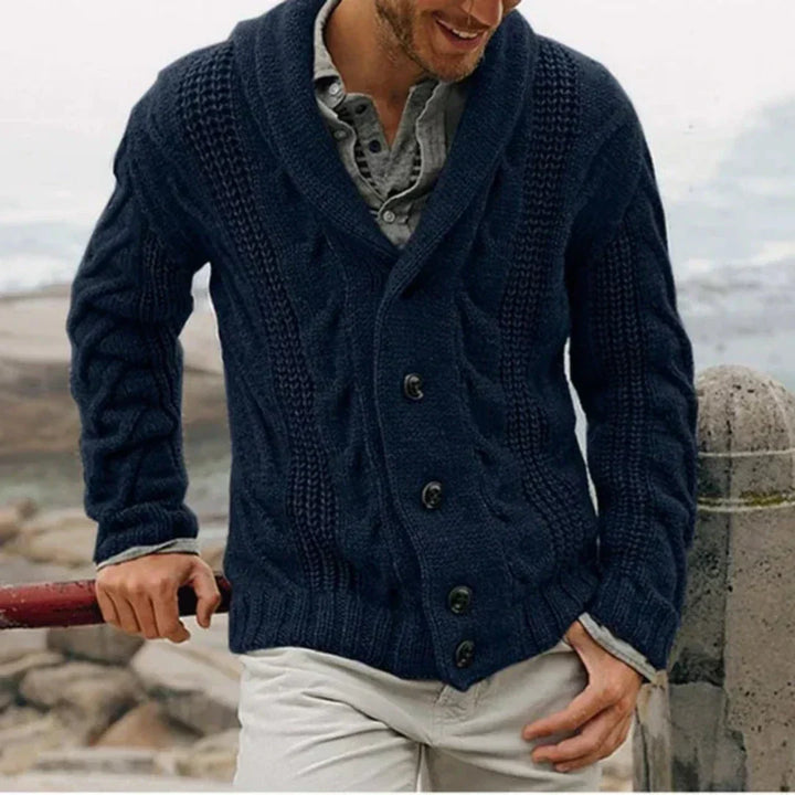 Men's cozy cable knit cardigan jacket with stylish shawl collar & button front. Perfect for warmth & casual layering.