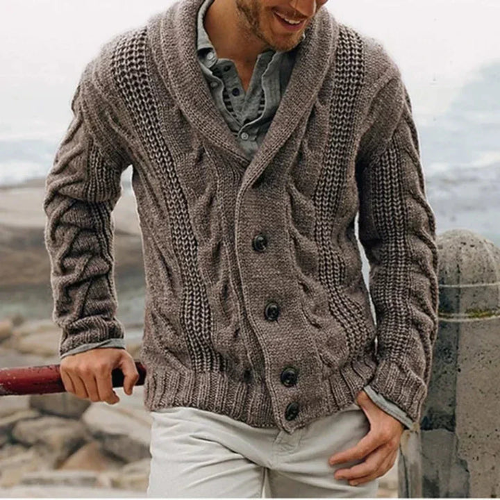 Relaxed fit men's cable knit cardigan. Soft, warm knit with a classic shawl collar, ideal for casual wear.