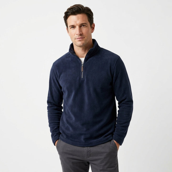Stylish men's quarter-zip henley sweatshirt with cozy fabric, great for layering in cooler weather.