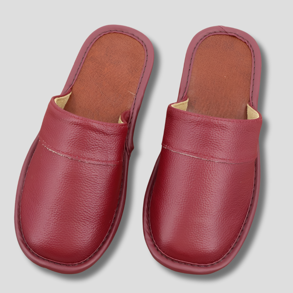 Men's cozy slip-on house slippers in grey, perfect for indoor comfort & relaxation. Soft, warm home footwear.