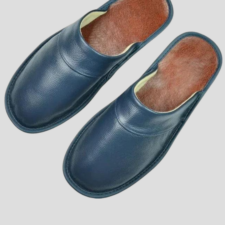 Warm men's slip-on house slippers for indoor wear. Comfortable and cozy home footwear for daily relaxation.