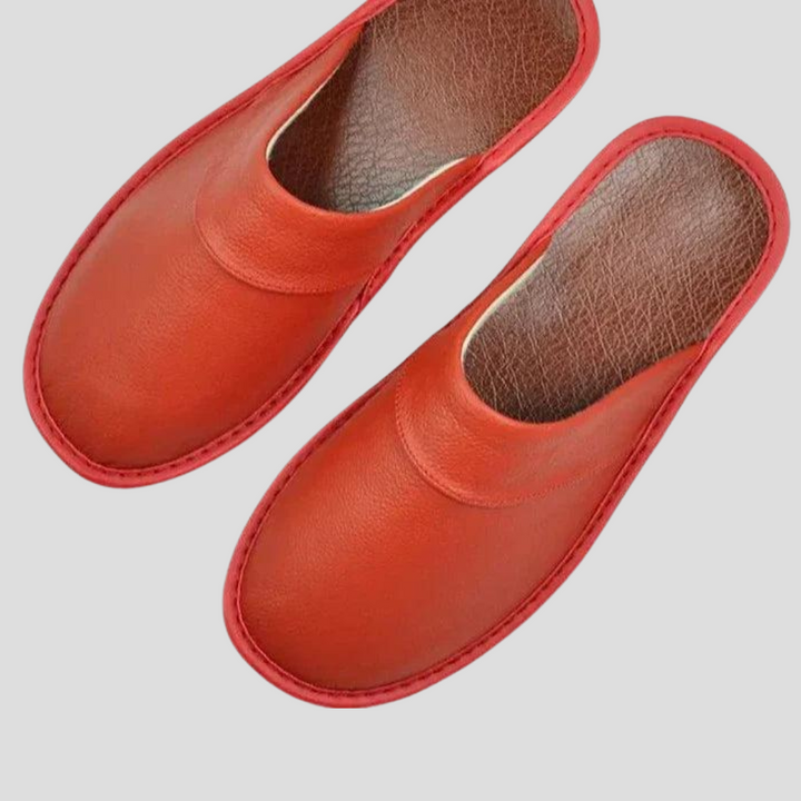 Men's charcoal grey slip-on house slippers, offering cozy comfort and warmth for indoor relaxation.