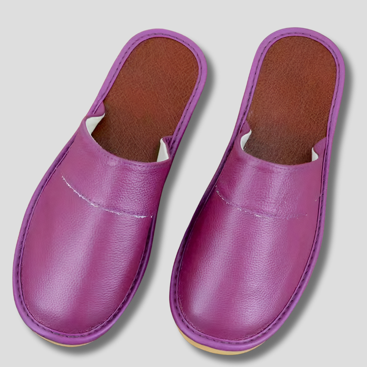 Relaxing men's slip-on indoor house slippers. Soft, comfortable home footwear for ultimate coziness.