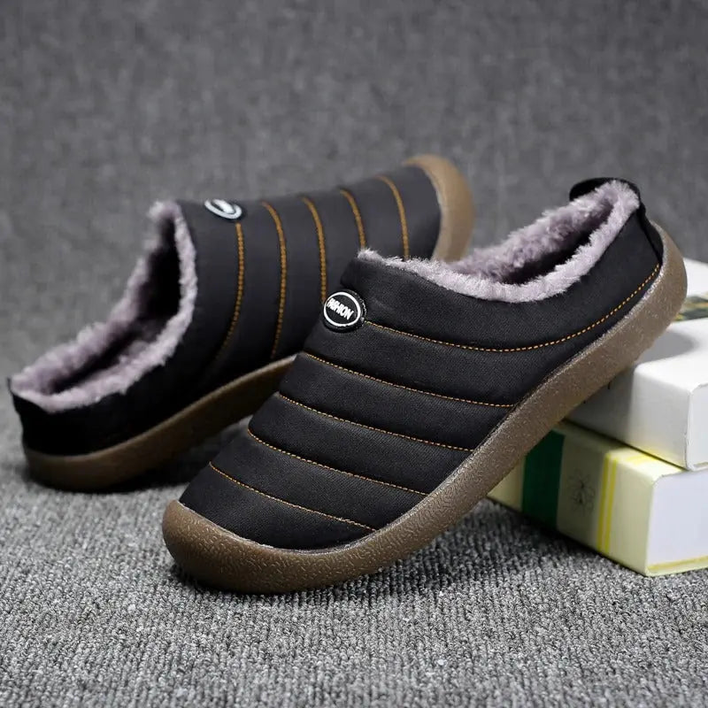 Side view: Men's warm slip-on winter house shoes, ideal for cozy indoor comfort.