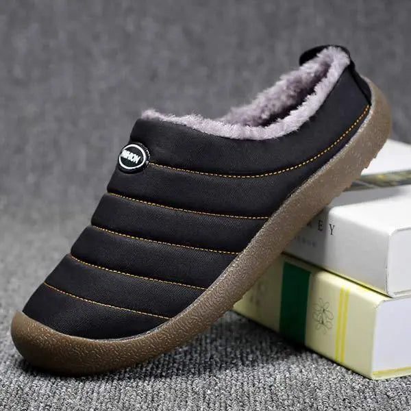 Top-down view: Comfortable men's winter slip-on slippers, perfect for home wear.