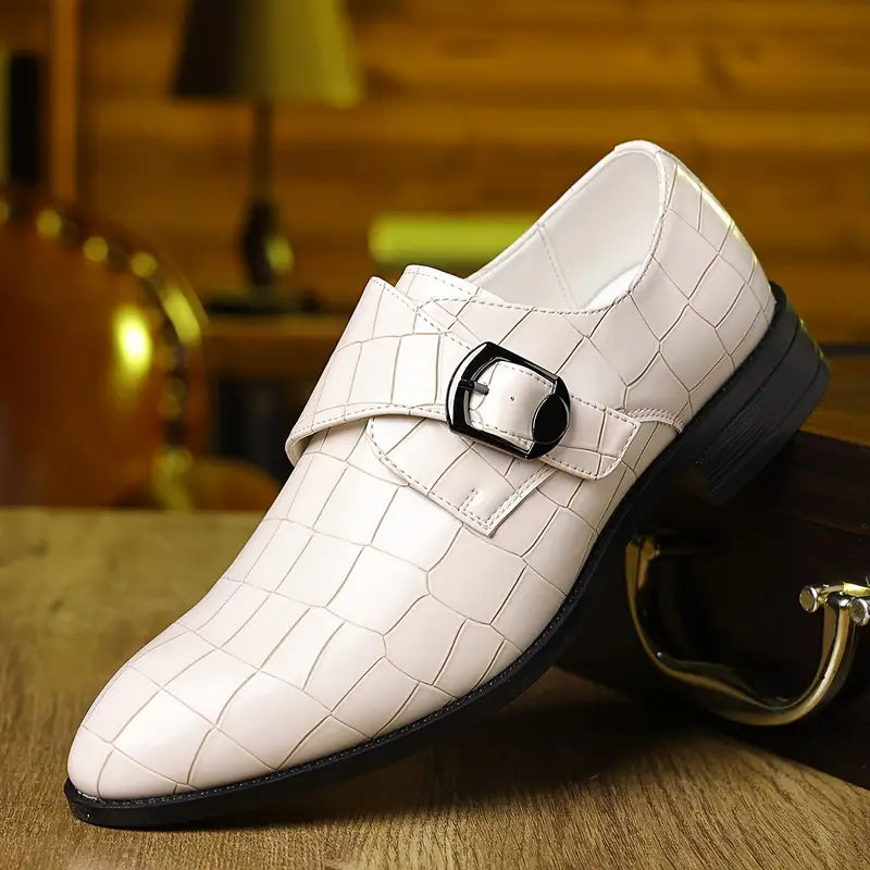 Textured crocodile-pattern men's loafers, slip-on style, with a decorative buckle and sleek tapered toe.