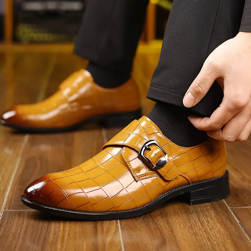 Men's fashion slip-on loafers in crocodile pattern, featuring a sleek tapered toe and stylish buckle detail.