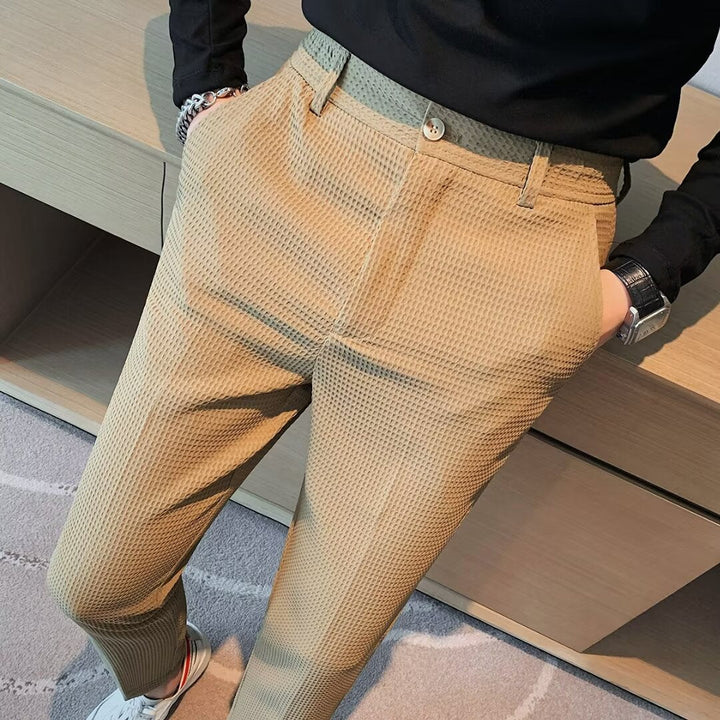 Men's smart casual cropped slim fit trousers. Modern chinos for stylish menswear fashion.