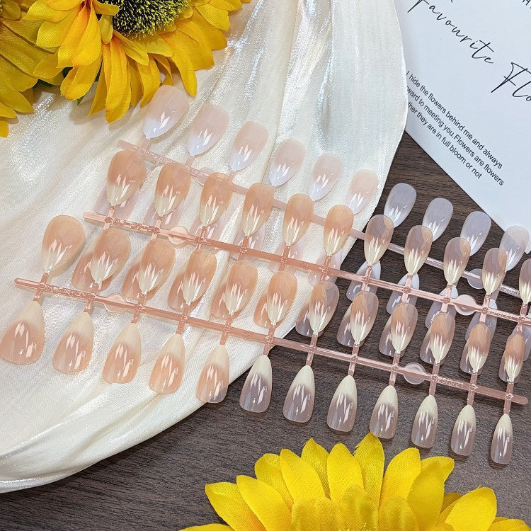 Detailed view of durable false nail tips for men, ready for custom nail art or a quick DIY manicure.