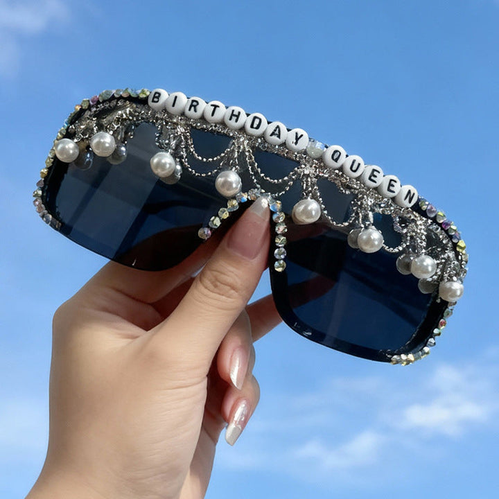 Men's black decorative sunglasses featuring pearl & rhinestone details. Glamour eyewear for party wear & stylish UV protection.