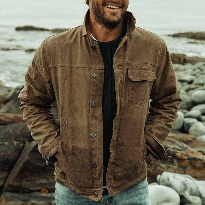 Stylish men's deep brown utility jacket, ideal for autumn adventures. Practical outdoor casual wear for men.