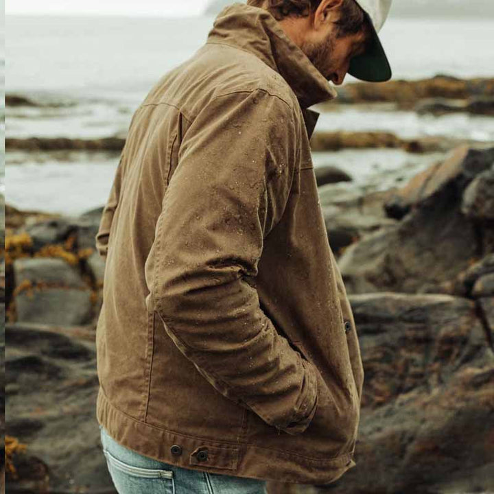 Deep brown men's utility jacket, an essential for autumn fashion. Versatile and rugged outdoor style menswear.