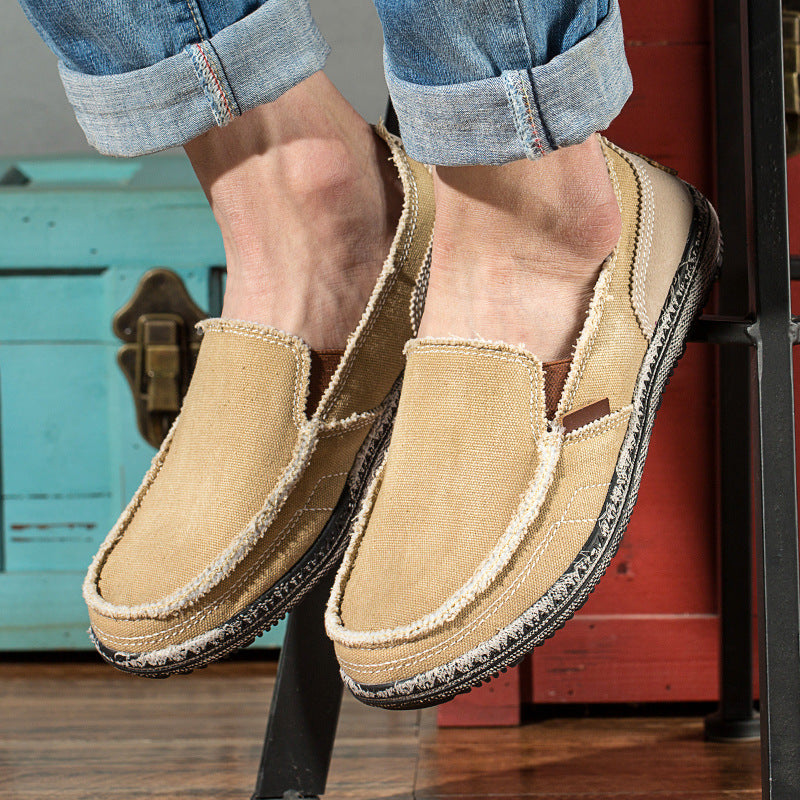 Textured men's slip-on loafers with a distressed finish, ideal for spring/summer casual wear.