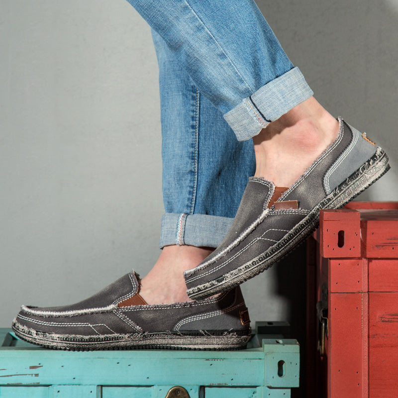 Round toe men's distressed slip-on loafers for versatile casual outfits and daily wear.
