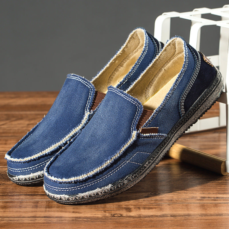 Textured distressed men's slip-on loafers offering comfortable, casual everyday footwear for men.