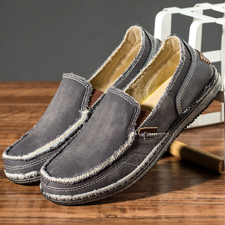 Men's casual distressed slip-on loafers, a comfortable and stylish choice for daily wear.