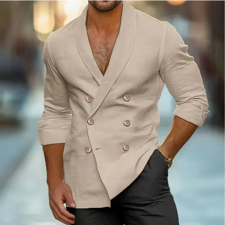 Stylish men's double-breasted tailored blazer. Close-up shows modern fit, quality fabric; great for event wear.
