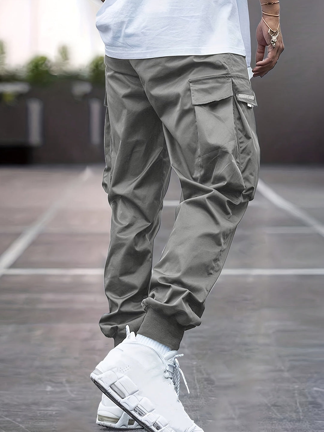 Comfortable men's cargo pants with drawstring waist, ideal for casual wear, outdoor activities, or urban fashion.