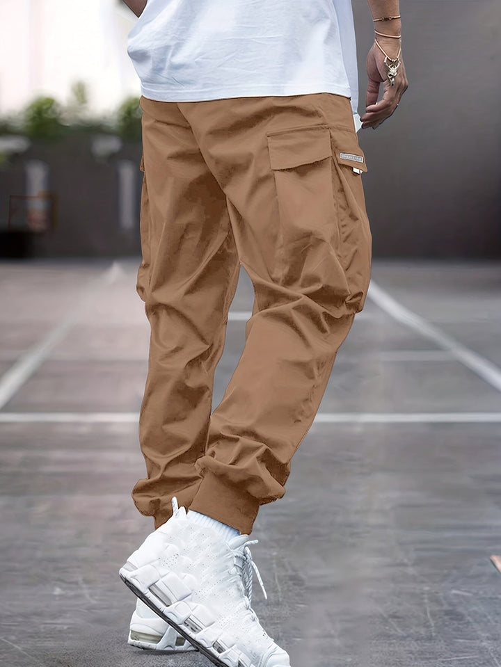 Versatile men's drawstring cargo pants offering ultimate comfort and utility, great for everyday wear or outdoor adventures.