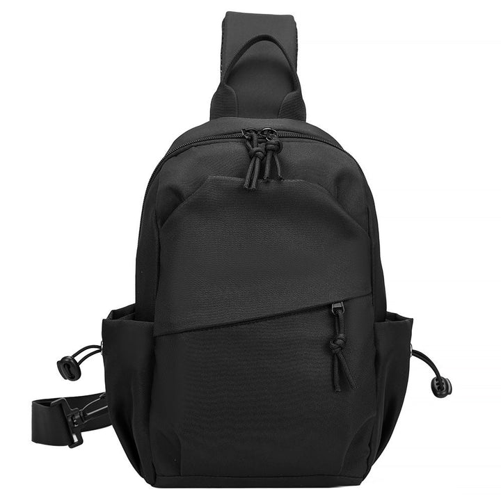 Stylish men's black sling backpack for urban adventure. Durable crossbody bag, ideal for travel & everyday carry.