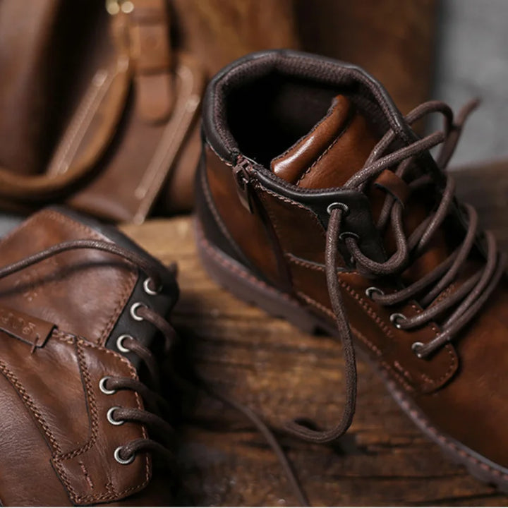 Comfortable brown men's work boots, durable ankle-high design suitable for everyday wear & tough jobs.