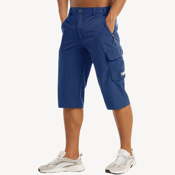 Relaxed fit men's cargo capris, versatile summer pants for comfort and outdoor adventures.