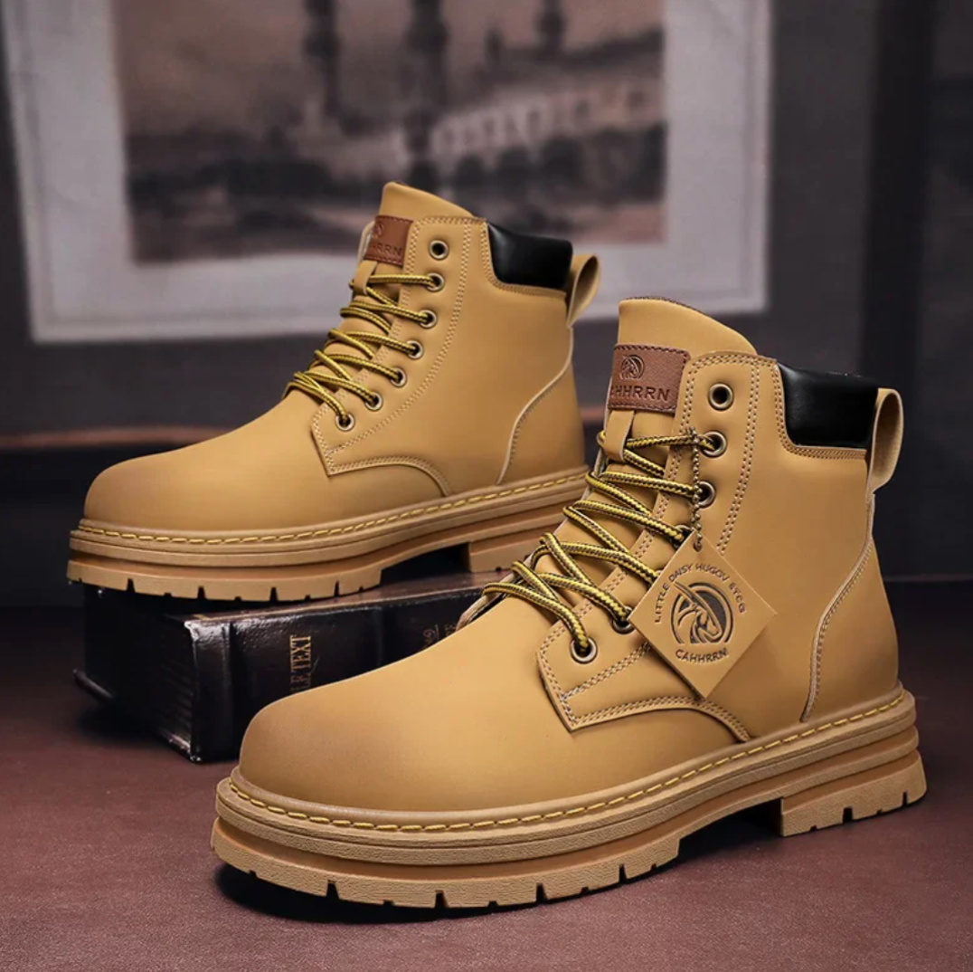 Robust men's utility footwear, lace-up design for optimal ankle support in tough work environments.