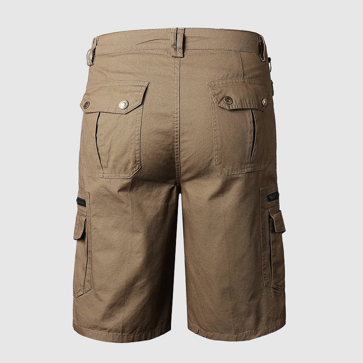 Active men's knee-length cargo shorts with many pockets, great for outdoor adventures and casual summer outfits.