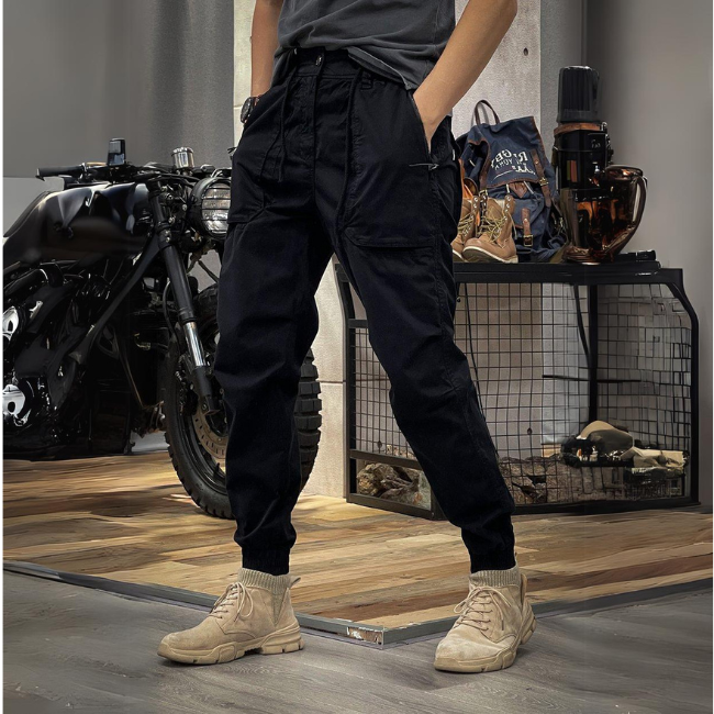 Men's tough workwear cargo pants with multiple pockets, reinforced knees, perfect for active jobs.