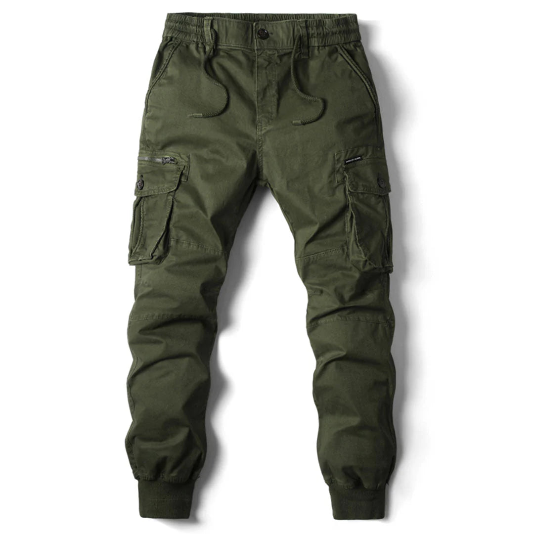 Close-up of rugged fabric and reinforced knees on men's tactical cargo pants. Durable bottoms for tough use.