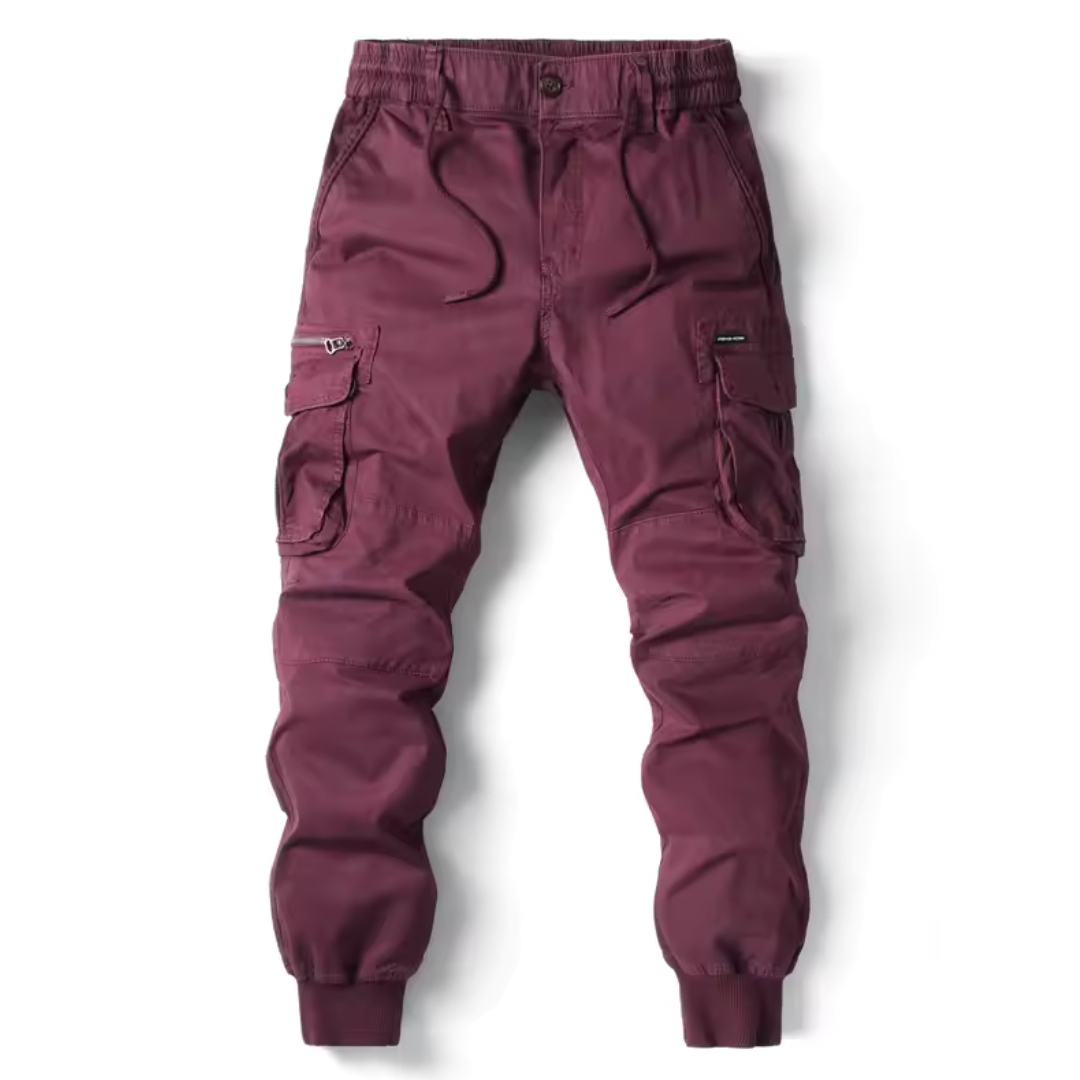 Khaki men's tactical cargo pants featuring large cargo pockets and reinforced stress points. Durable & practical.
