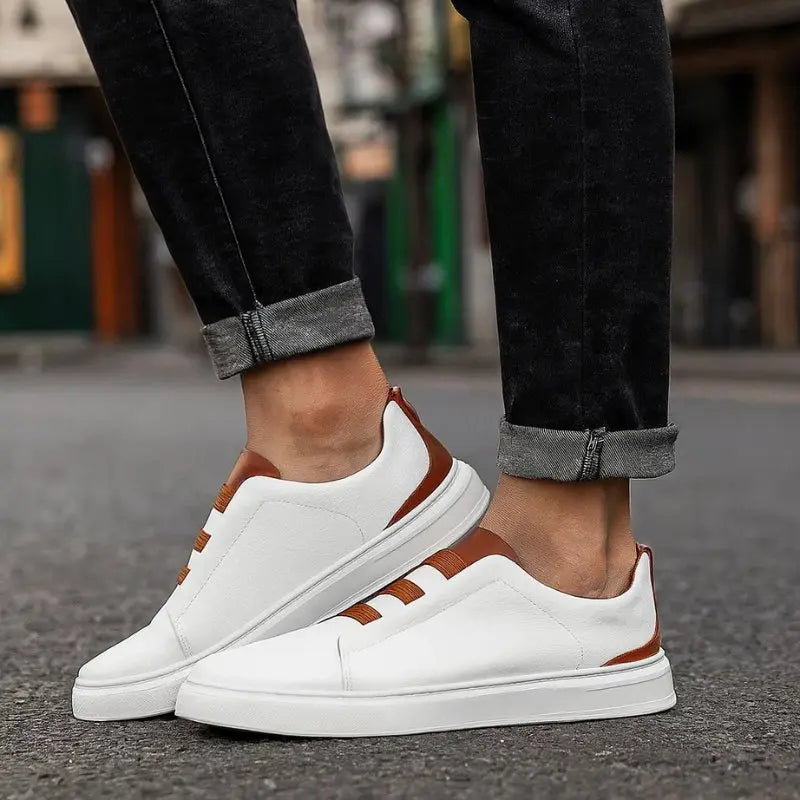 Modern men's slip-on trainers with loop lacing, offering effortless comfort and stylish everyday footwear.