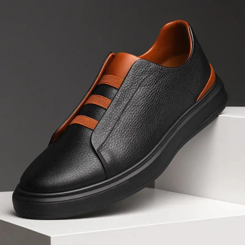 Side view of men's comfortable slip-on sneakers, featuring loop lacing for easy wear and athletic fashion.