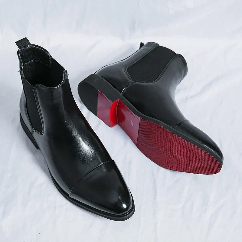 Men's elegant black leather slip-on boots. Perfect for formal or casual sophisticated style and everyday wear.